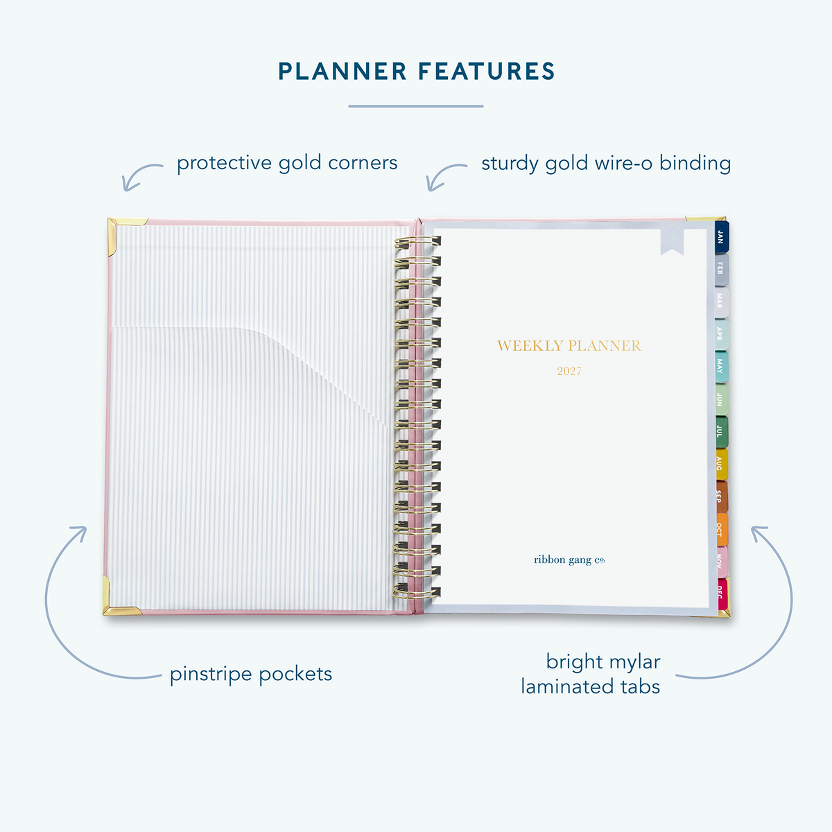 A blush pink spiral bound 2027 planner on a white background open to the first page showing a pocket inside the front cover and a title page.