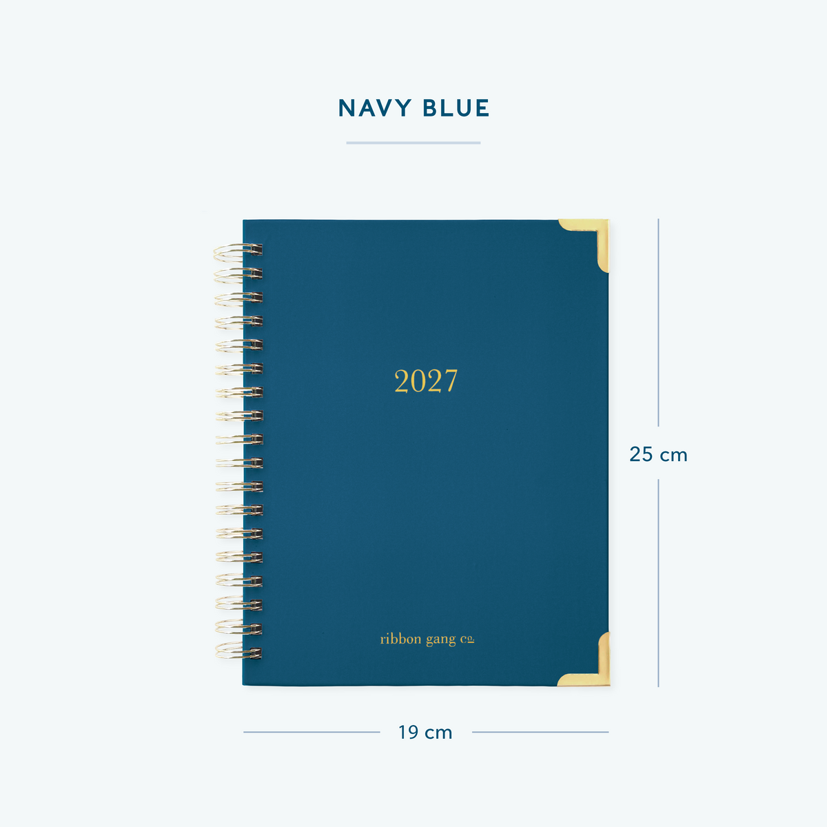 A classic navy spiral bound 2027 planner with gold lettering and gold corners on a white background showing dimensions of 25 cm high and 19 cm wide.