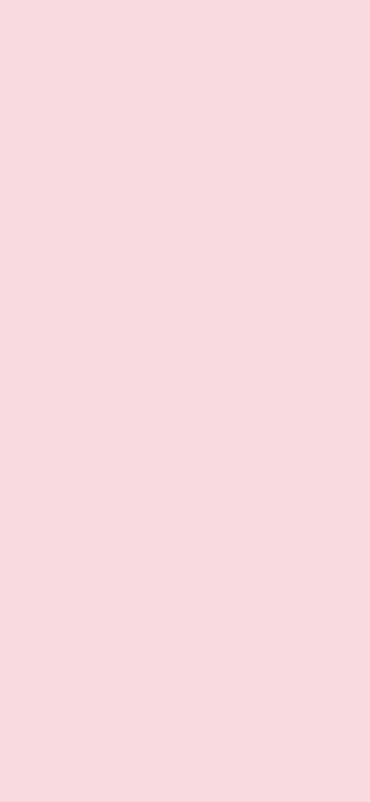 One-colour blank phone wallpaper in blush pink.